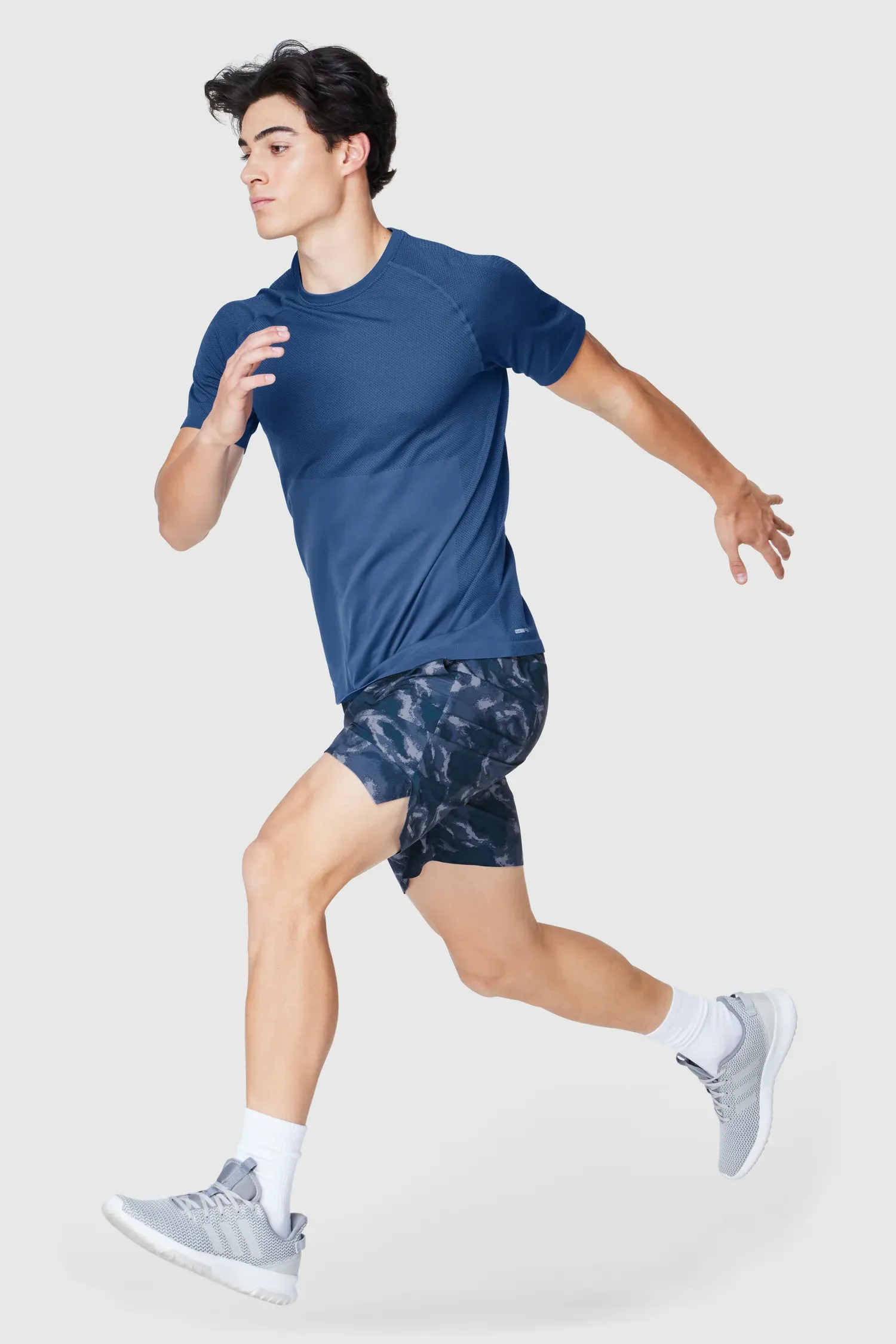 Aviate — Fit in Motion, Seamless tee + 7" short, mid-stride