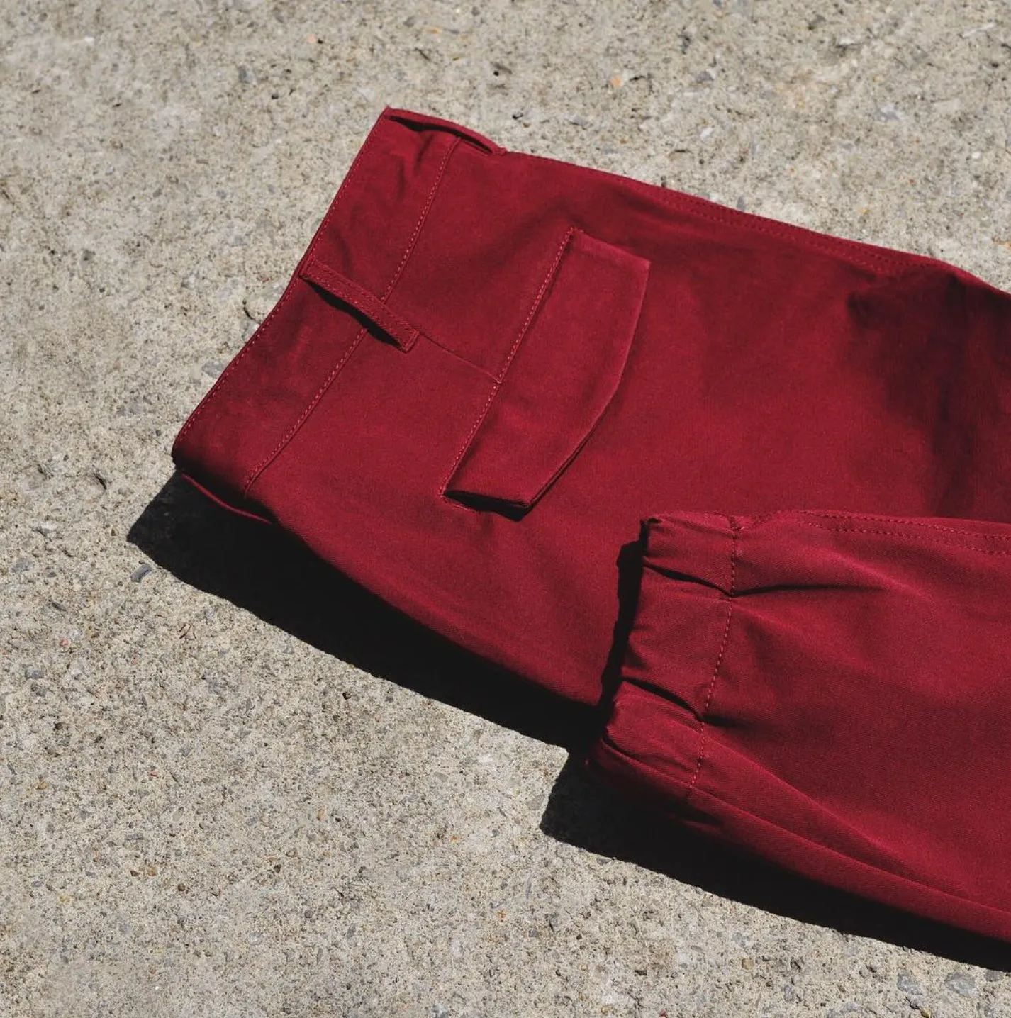State Concepts — burgundy pant flat lay