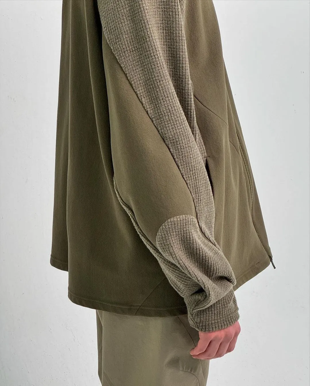 FWD — vision reference, grid fleece, body-mapped panels