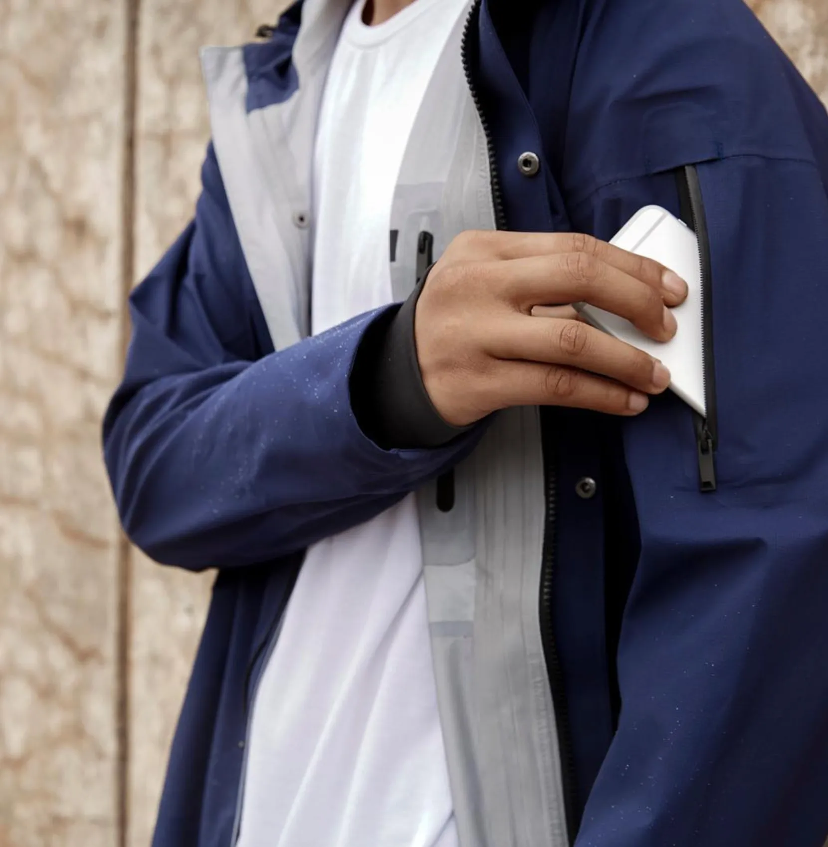 State Concepts — navy shell, sleeve pocket